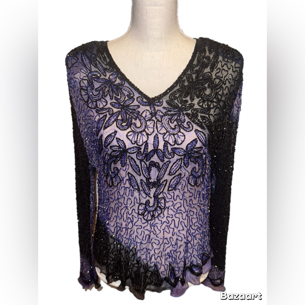 Black and purple beaded long sleeve top with a asymmetrical sleeve